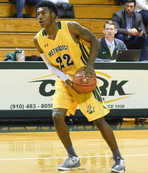 Methodist University junior forward Davion Ayabarreno looks to take the ball up the court during a game earlier this season. Ayabarreno, a former Northside High standout and area player of the year, leads NCAA Division III Methodist in scoring with 18.7 points per game.