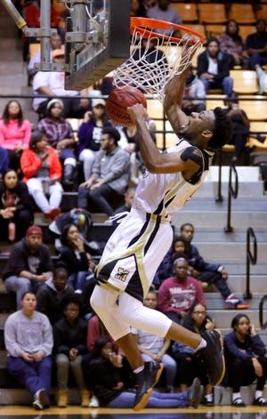Keyshawn Embery is averaging 28.4 points per game for Midwest City. All three teams from Mid-Del Schools qualified for the boys state tournament this season. [PHOTO BY BRYAN TERRY, THE OKLAHOMAN]