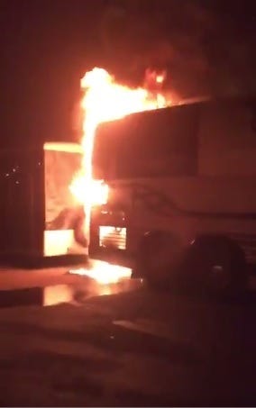Pictured is a video screenshot from the Eli Young Band’s bus catching fire early Wednesday in Topeka. (Twitter)