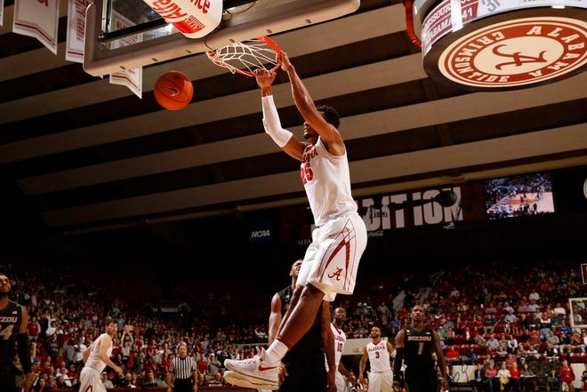 Alabama's Braxton Key dunks during the Crimson Tide's game with Missouri on Wednesday, Jan. 18, 2016 at Coleman Coliseum.