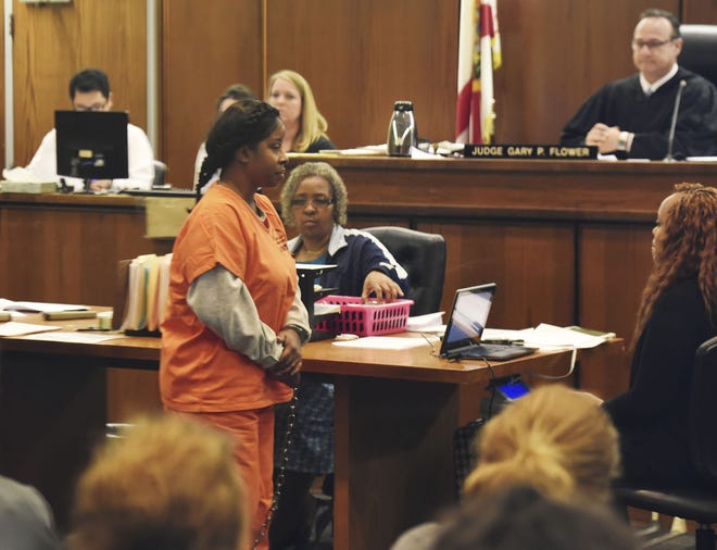 Gloria Williams, the suspect in the kidnapping of a newborn 18 years ago from a Jacksonville, Fla., hospital leaves the courtroom Wednesday, Jan. 18. 2017, in Jacksonville. Her arrest came after DNA tests helped authorities identify the woman who had been living with Williams in Walterboro, S.C., as Kamiyah Mobley. (Bob Self/The Florida Times-Union via AP)