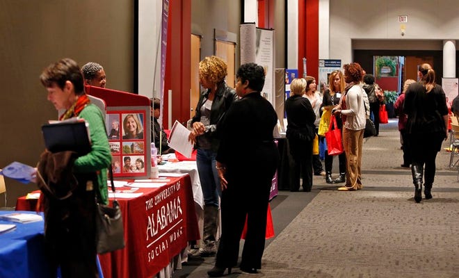 Attendees browse informational exhibits during the ninth annual Doing What Matters for Alabama's Children at the Bryant Conference Center Tuesday, Jan. 27, 2015. File staff photo