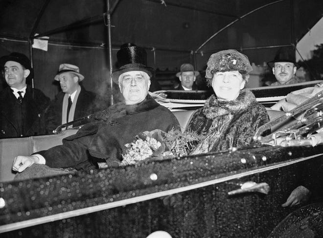 President Franklin D. Roosevelt and first lady Eleanor Roosevelt are seen up Pennsylvania Avenue during the inaugural parade in Washington, Jan. 4, 1937. This will be Roosevelt's second term in office.