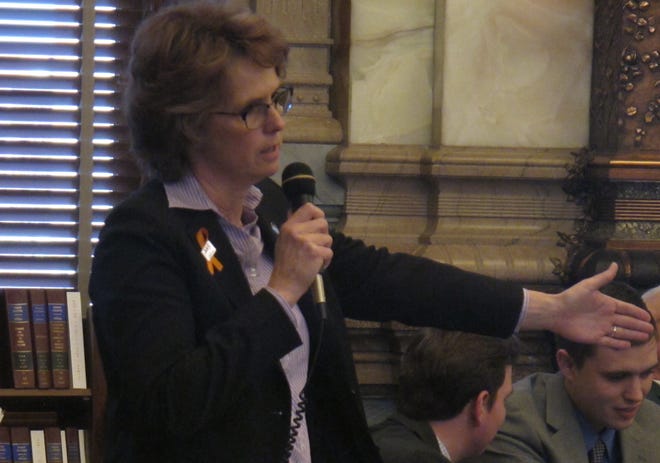 Pictured is Kansas state Sen. Carolyn McGinn, a Sedgwick Republican, at the Statehouse in Topeka. The Senate Ways and Means Committee chairwoman, said she’s drafting a bill to cut spending to close the projected $342 million shortfall in the state’s budget. She said it would reduce aid to schools by between $90 million and $125 million, and she hopes to have it ready next week. (File photograph/The Associated Press)