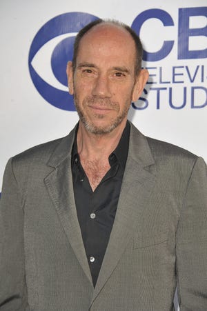 This file photo shows actor Miguel Ferrer at CBS Television Studios Summer Soiree in Los Angeles on May 19, 2014. Ferrer died Thursday of cancer at his Los Angeles home. He was 61. (Photo by Katy Winn//Invision/AP, File)