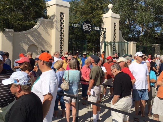 Orioles fans line up outside Ed Smith Stadium in Sarasota on Saturday to buy tickets to spring training games. HERALD-TRIBUNE STAFF PHOTO / DOUG FERNANDES
