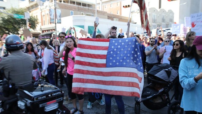 The Women’s March on Austin fills downtown streets and state Capitol with thousands of people on Saturday. EMS officials say medics had treated more than 20 people for medical complaints. RALPH BARRERA // AMERICAN-STATESMAN