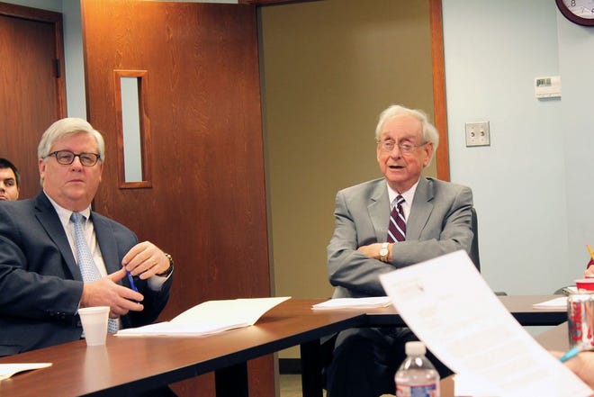Gordon Floyd, interim superintendent of Fort Smith Public Schools, left, and Mitch Llewellyn are seen during a Fort Smith School Board meeting in December. The board tabled a motion to reject the settlement terms offered by local attorney Joey McCutchen on a recent Arkansas Freedom of Information Act violation lawsuit. TIMES RECORD FILE PHOTO