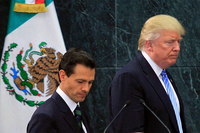 President Trump, right, with Mexican President Enrique Pena Nieto after their Aug. 31, 2016, meeting in Mexico City. Trump’s executive order to immediately start construction of a border wall has widened his rift with Mexico. (Str / Xinhua / Sipa USA / TNS)