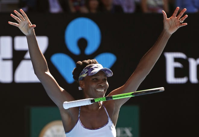 United States' Venus Williams celebrates after defeating compatriot Coco Vandeweghe during their semifinal at the Australian Open in Melbourne, Australia, on Thursday. (AP Photo/Dita Alangkara)