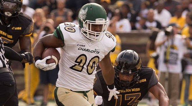 Former East Gaston High standout Robert Washington (20) during Charlotte's 38-27 win at Southern Mississippi last season. Washington is expected to be a contender for the starting running back as a sophomore for the 49ers next season. (Photo courtesy Charlotte 49ers athletics)