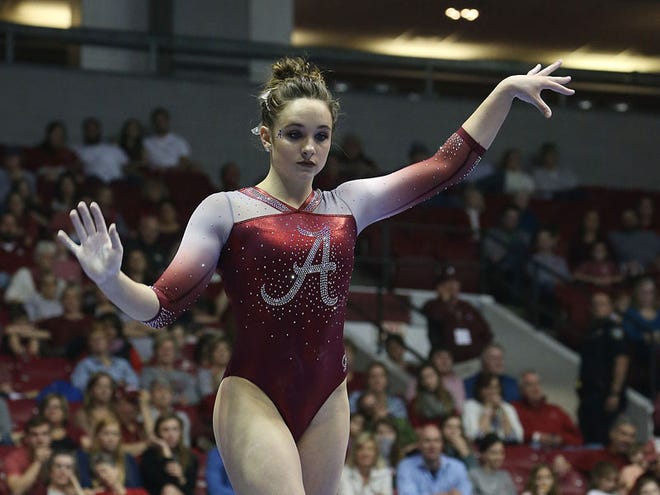 Alabama's Wynter Childers performs her routine on balance beam during the first home meet against LSU at Coleman Coliseum in Tuscaloosa on Friday, Jan. 13, 2017.