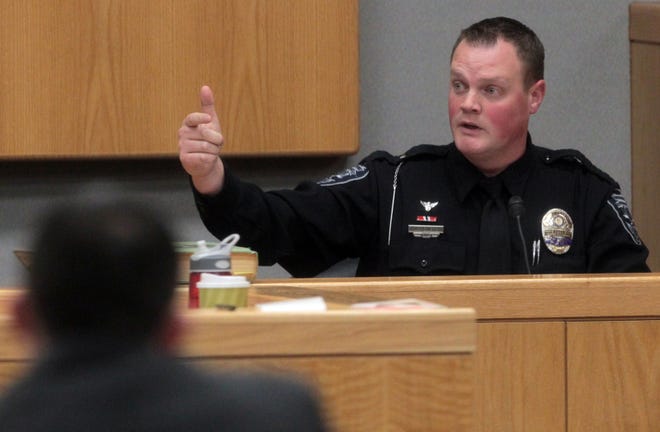 Gastonia Police Officer J.R. Ewers testifies during the trial of Donna Hayes Friday morning at the Gaston County Courthouse on Martin Luther King Jr. Way. PHOTO MIKE HENSDILL/THE GAZETTE