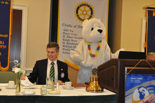 Will Hodges, left, president of the Rotary Club of Athens, listens as Tripp “Beary” Bridges promotes the Athens Rotary Polar Bear Plungefest scheduled Feb. 11 at Lake Chapman in Sandy Creek Park.