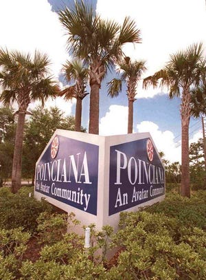 The main sign to Poinciana, which appears in this week's Gigs & Garlands
