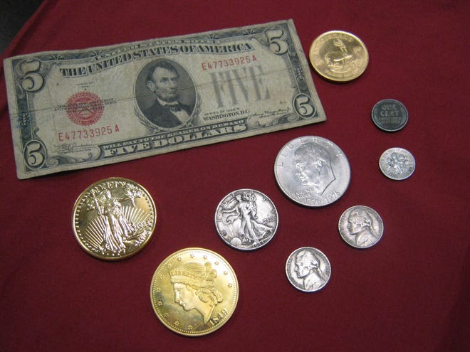 A Krugerrand and several miscellaneous coins, along with an unusual $5 bill, were found in Cleveland County Salvation Army red kettles for the 2016 Christmas season. They are being offered for sealed bids now. The money gained from the bids on these unusual finds will benefit the Salvation Army. 

Special to The Star