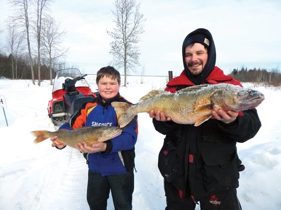 The Michalski Clan etched their names in Munuscong Bay history on Sunday. Ramsey, 10, brought a 3.96 pound walleye to the scales winning the Youth Division, while his Uncle Ramsey took first place in the 2017 Walleye Jamboree with a 9.64 pound trophy.