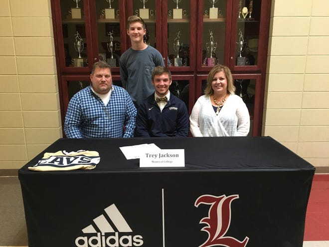 Landrum second baseman Trey Jackson signs to play baseball for Montreat during a ceremony at his high school on Tuesday. SUBMITTED PHOTO