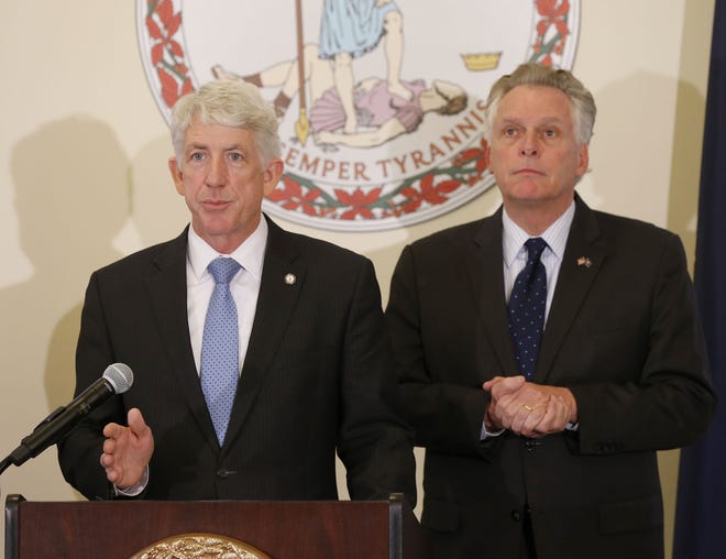Attorney General Mark R. Herring (left) and Gov. Terry McAuliffe said Virginia will fight President Donald Trump’s executive order.