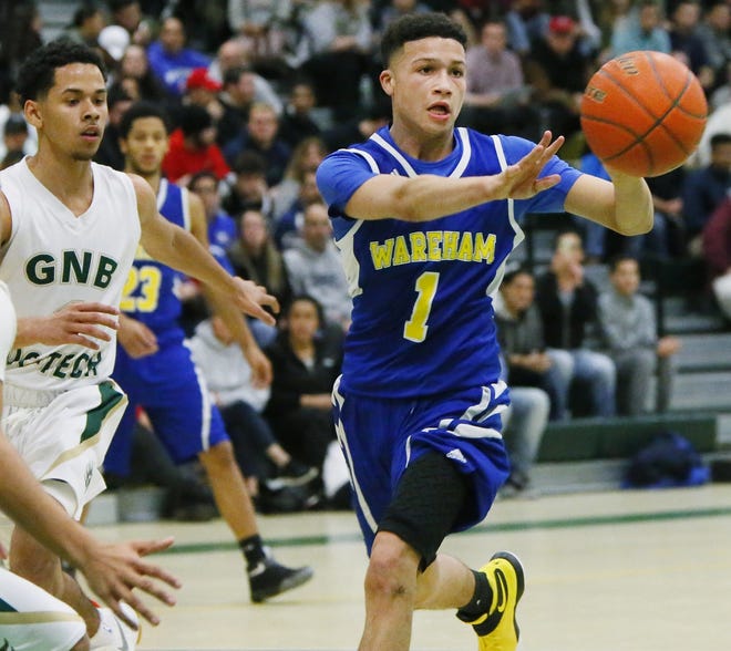 Wareham's Dominic Mello fires a pass to a teammate in the second quarter against GNB Voc-Tech. Mello is second on the Vikings in scoring and leads the area in 3-pointers made as a freshman. MIKE VALERI/THE STANDARD-TIMES/SCMG
