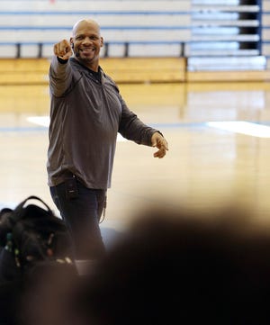 Former NFL player Steve Fitzhugh gives a "Make the Choice" presentation to encourage student athletes at Tuscaloosa County High to be drug-free in the school's gymnasium on Monday. Staff Photo/Erin Nelson