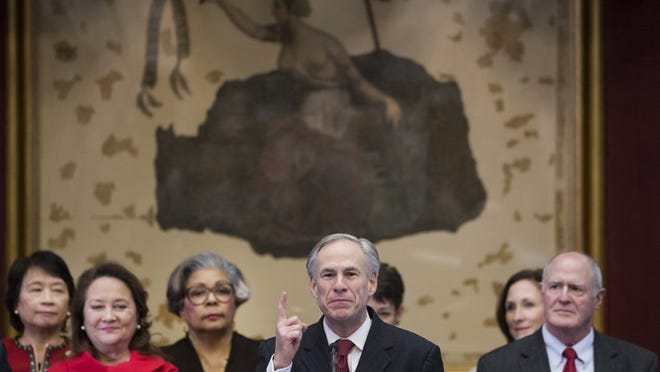 Gov. Greg Abbott delivers his State of the State speech during the 85th meeting of the Legislature in the House chamber at the Capitol on Tuesday.