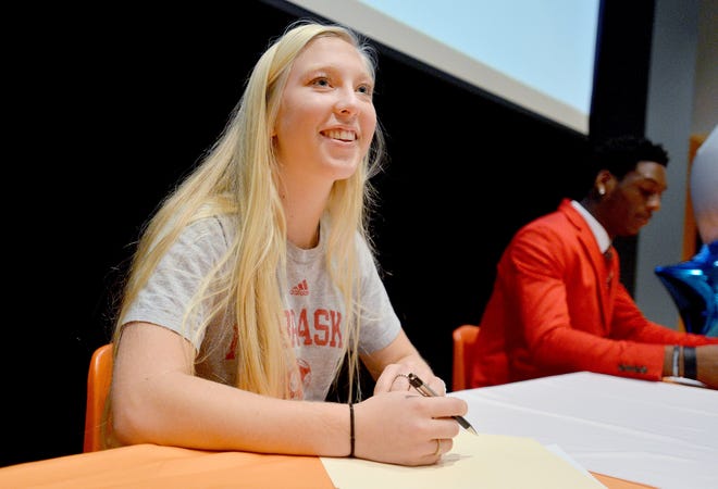 mount Dora soccer standout Sarah Thrush gets ready to sign a national letter-of-intent to play soccer at the University of Nebraska at Mount Dora High School on Wednesday. Amber Riccinto / Daily Commercial