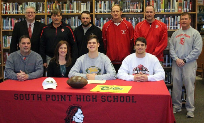 Nick Muse signed his national letter of intent to play football at the College of William & Mary Wednesday morning at South Point High School. Back row, left to right: Principal Gary Ford, head coach Mickey Lineberger, assistant coaches Adam Hodge, Joe Shepherd and Brian Andrews and athletic director Kent Hyde. Front row, left to right: Kevin Muse (dad), Shannon Muse (mom), Nick Muse and Tanner Muse (brother). Jack Flagler/The Gaston Gazette