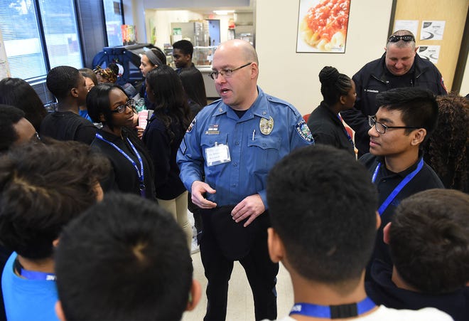 Sgt. Robert Race, of the Bensalem Township Police Department, speaks to ninth-grade students at School Lane Charter School in Bensalem on Thursday, Feb. 2, 2017.