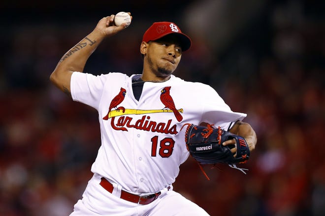 St. Louis Cardinals starting pitcher Carlos Martinez throws during the first inning of a game against the Pittsburgh Pirates on Sept. 30, 2016, in St. Louis. The Cardinals and Martinez have agreed to a $51 million, five-year contract. (AP Photo/Billy Hurst, File)