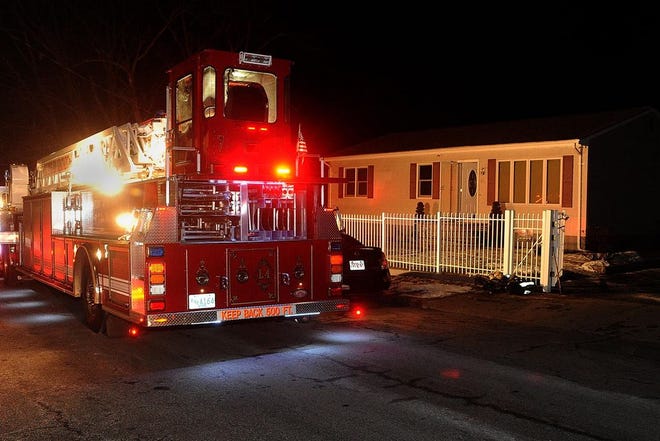 Fall River fire crews respond to a fire at 38 Keeley St. on Thursday night.