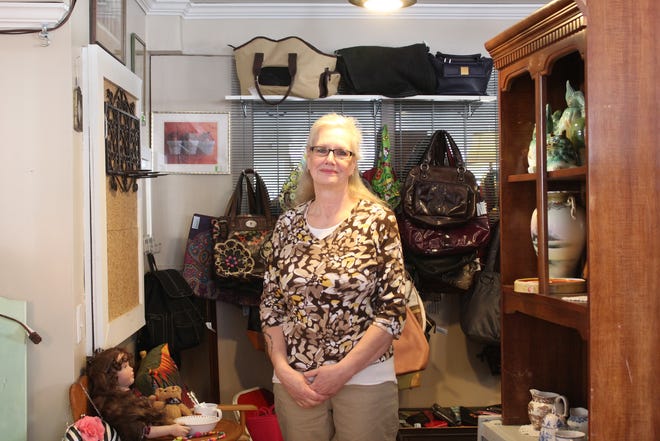 Owner Cheryl Huntley stands inside The Consignment Shop at its new location 1137 Fourth Ave. in Lake Odessa. Darcy Meade/Ionia Sentinel-Standard