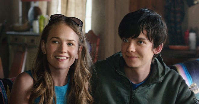 This image shows Britt Robertson, left, and Asa Butterfield in a scene from, "The Space Between Us." (STX Entertainment)