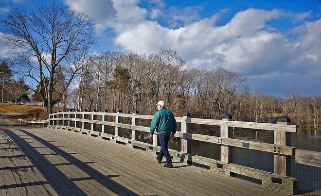 Mike Frizzell of Hull took a walk this week at World's End in Hingham. The Trustees Of Reservations is seeking the town's approval for more parking and other changes.