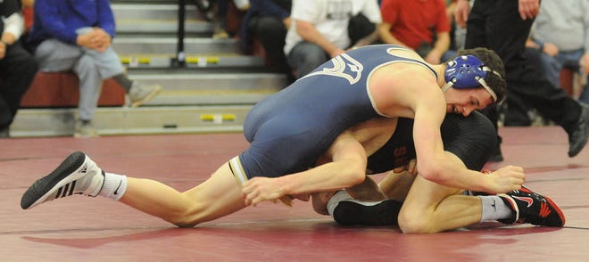 Boyertown's David Campbell defeated Council Rock South's Mike McKinney (left), 9-4 in the 126-pound match at the District One Team Championships on Saturday, February 4, 2017, at Pottsgrove High School in Pottstown.