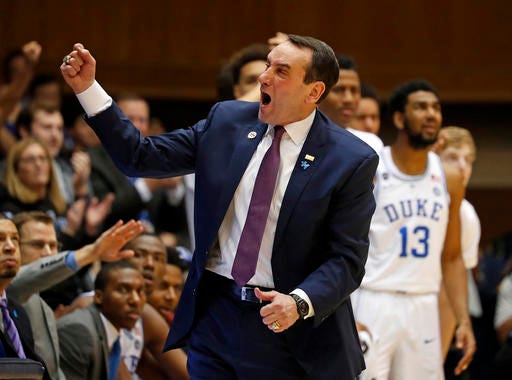 Duke head coach Mike Krzyzewski instructs his players from the sidelines during the first half of an NCAA college basketball game against Pittsburgh in Durham, N.C., Saturday, Feb. 4, 2017. (AP Photo/Karl B DeBlaker)