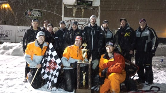 Gabe Bunke celebrated another win with co-drivers Taylor Bunke (his son) and Aaron Christensen as well as the rest of the Bunke Racing Team after taking the checkered flag in the 49th running of the International 500 Snowmobile Race.