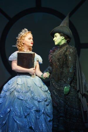 Amanda Jane Cooper as Glinda and Jessica Vosk as Elphaba iin the national touring company of the hit musical "Wicked." Photo by Joan Marcus.