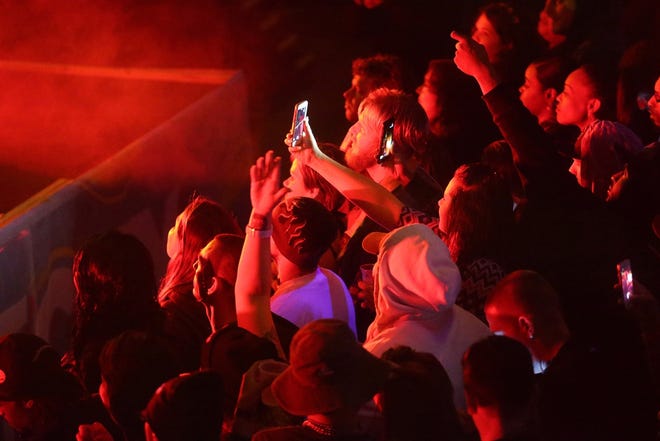 Fans waited hours in chilly temperatures to hear Bone Thugs-N-Harmony perform at Club La Vela during the start of the first week of Spring Break 2015 in Panama City Beach. Hotel reservations are down this year, hoteliers say. HEATHER HOWARD/NEWS HERALD FILE