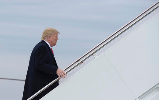 President Donald Trump walks up the steps of Air Force One at Andrews Air Force Base, Md., Friday, Feb. 3, 2017. Trump is heading to Florida to spend the weekend at Mar-a-Lago.