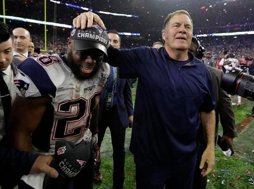 New England Patriots head coach Bill Belichick celebrates with James White after the NFL Super Bowl 51 football game against the Atlanta Falcons Sunday, Feb. 5, 2017, in Houston. The Patriots won 34-28 in overtime. (AP Photo/Eric Gay)