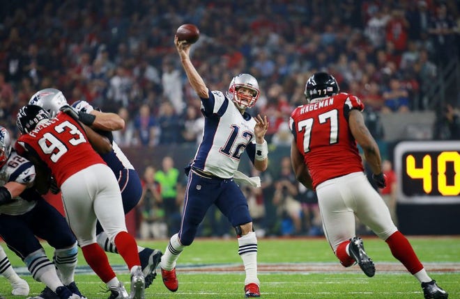 Tom Brady completes a pass to Danny Amendola in Super Bowl LI in Houston.
