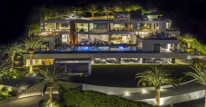 This 38,000-square-foot spec house in the Bel-Air area of Los Angeles took four years and 250 workers to build. A $30 million car collection, custom furnishings and a range of amenities are included in the $250 million price tag. [BRUCE MAKOWSKY / BAM LUXURY DEVELOPMENT]