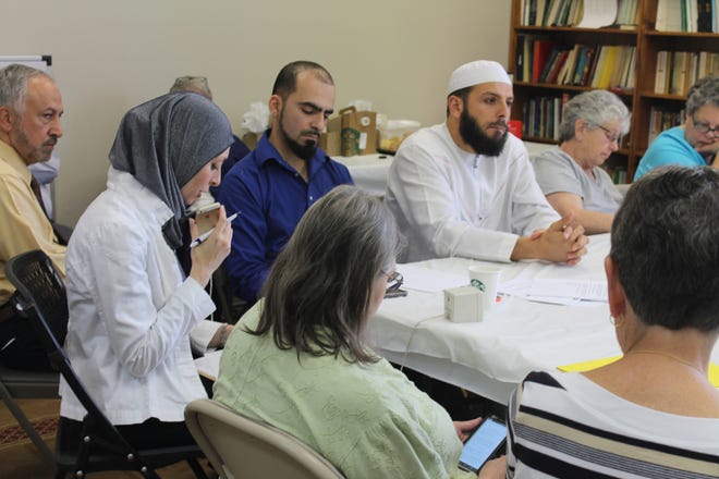 Hiba Rahim, along with the local Muslim community and other area residents, leads a conference call Tuesday questioning Rep. Neal Dunn for his support of President Donald Trump’s immigration ban. COLLIN BREAUX/THE NEWS HERALD