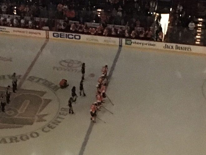 The Flyers held a moment of silence prior to Thursday night's game for fallen Springfield (Montco) hockey player Nick Bond.