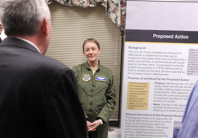 Maj. Sarah Bergkamp of Air Mobility Command, Scott Air Force Base in Illinois, talks with members of the public at Tuesday's public scoping at the New Hanover Township Senior Center in Cookstown.