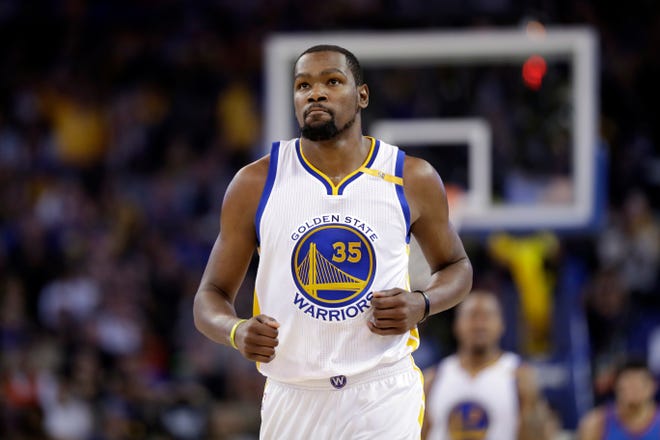 Golden State Warriors' Kevin Durant (35) during the first half of an NBA basketball game against the Oklahoma City Thunder Wednesday, Jan. 18, 2017, in Oakland, Calif. (AP Photo/Marcio Jose Sanchez)
