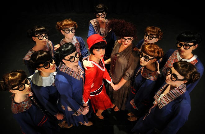 A group of stenographers encourage Millie (center), played by Sofie Flores, to "Forget About the Boy" in a musical scene from the Salina South High School production of "Thoroughly Modern Millie."