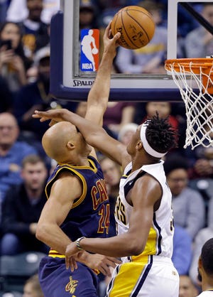 Indiana Pacers center Myles Turner (33) fouls Cleveland Cavaliers forward Richard Jefferson (24) as he goes up for a dunk during the second half of a game in Indianapolis, Wednesday, Feb. 8, 2017. The Cavaliers defeated the Pacers 132-117. (AP Photo/Michael Conroy)