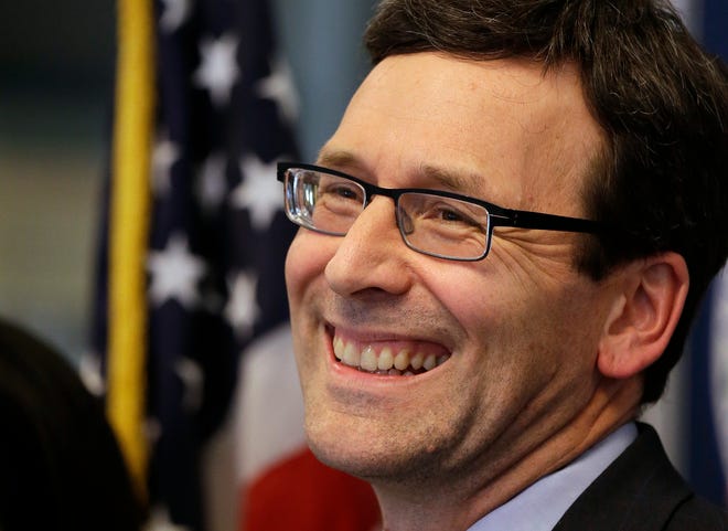 Washington Attorney General Bob Ferguson smiles at a news conference about a federal appeals court’s refusal to reinstate President Donald Trump’s ban on travelers from seven predominantly Muslim nations, Thursday, Feb. 9, 2017, in Seattle. The ruling dealt another legal setback to the new administration’s immigration policy. In a unanimous decision, the panel of three judges from the San Francisco-based 9th U.S. Circuit Court of Appeals declined to block a lower-court ruling that suspended the ban and allowed previously barred travelers to enter the U.S. An appeal to the U.S. Supreme Court is possible. (AP Photo/Elaine Thompson)